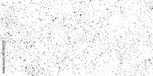 Diagonal black and gray scratches or streaks on a lighter background, The texture resemble worn or scratched material such as painted design, A close up view of a textured surface with pattern.