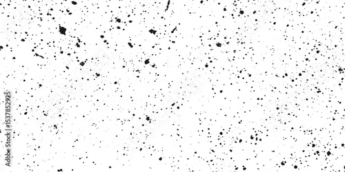 Diagonal black and gray scratches or streaks on a lighter background, The texture resemble worn or scratched material such as painted design, A close up view of a textured surface with pattern.