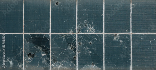 Close-Up of Cracked Wired Glass Window with Heavy Damage