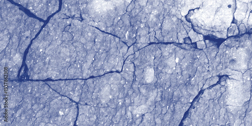 Abstract blue textured surface with cracks and subtle detail provides a visual representation of weathering and erosion for creative projects.