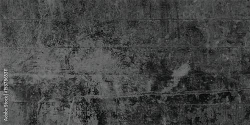 Weathered and distressed dark gray concrete wall texture showing a rough and aged surface with visible cracks and imperfections, ideal for backgrounds.