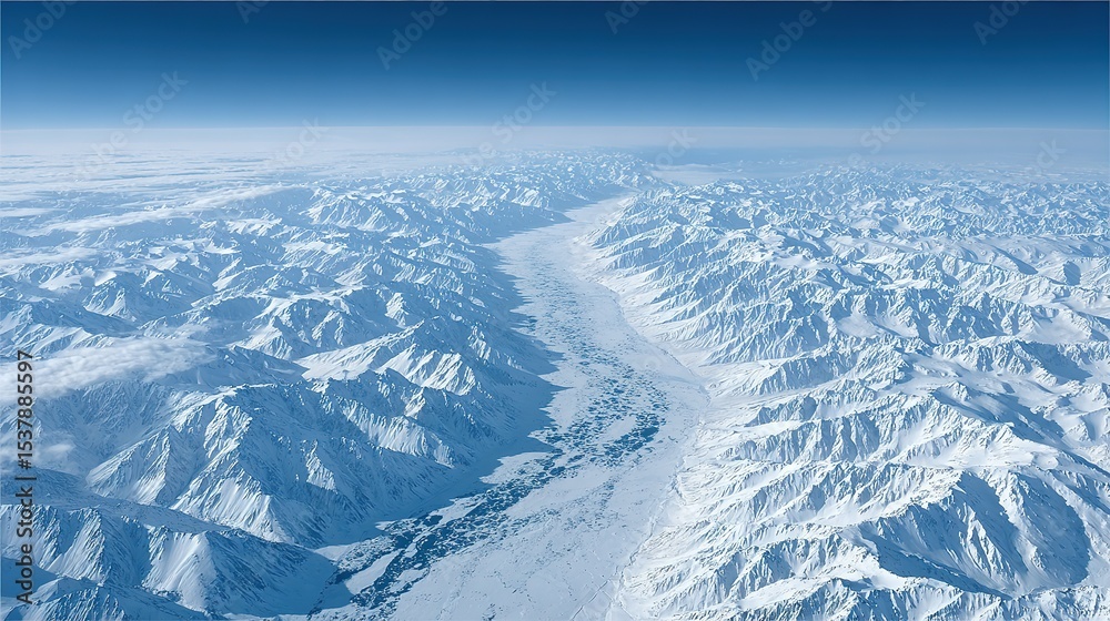 Fototapeta premium Snowy mountain range viewed from above.