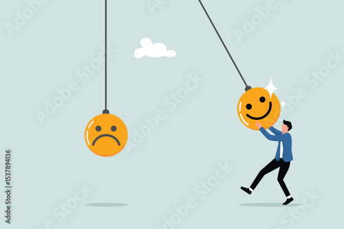 Optimism, happiness or positive thinking inspires others to be happy, emotional happiness and sadness, man holding a pendulum ball with a smiley face to hit other people's sad faces.