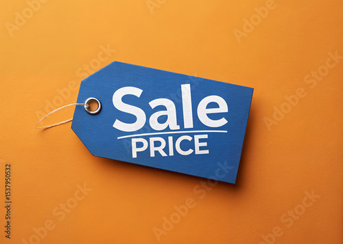 Sale Price Tag: A close-up shot of a blue sale price tag against an orange backdrop, offering a compelling visual representation of retail discounts, promotions, and savings.