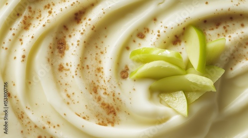 Macro overhead view of low-fat plain yogurt topped with grated green apple and a hint of cinnamon, showcasing swirl texture and fine detail under soft natural light, ultra-realistic 