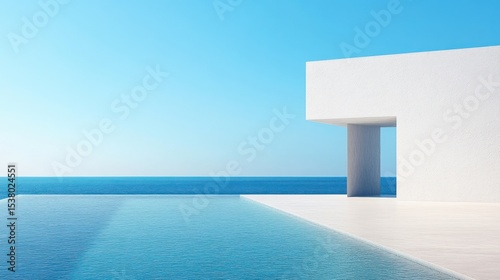 Modern architectural building with infinity pool overlooking the ocean.