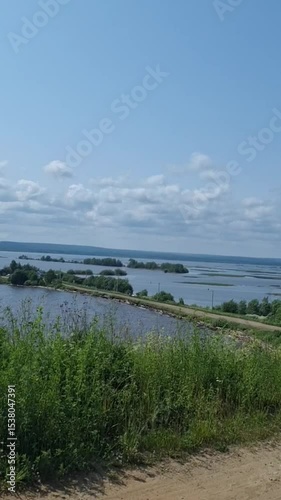 Wallpaper Mural Scenic river view with greenery under a clear blue sky   Torontodigital.ca