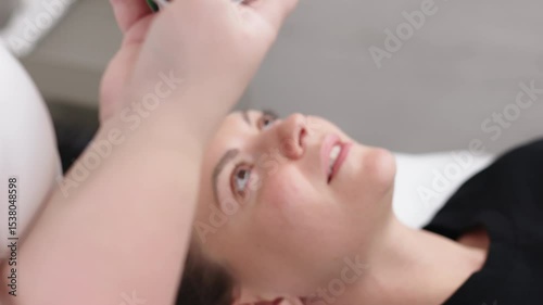 Wallpaper Mural Photo of young woman's lips on smartphone screen. Cosmetologist taking a photo of lips after procedure. Concept of result before and after procedure. Torontodigital.ca