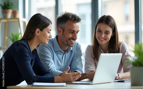 Successful business team are discussing new strategies in office on laptop. Small and medium business development concept. High quality