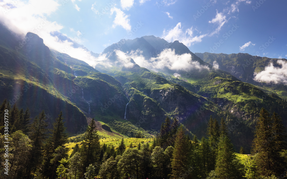 Fototapeta premium Amazing tourquise Hintersee with waterfalls and Austria Alps, Hohe Tauern landscape with mountain and lake