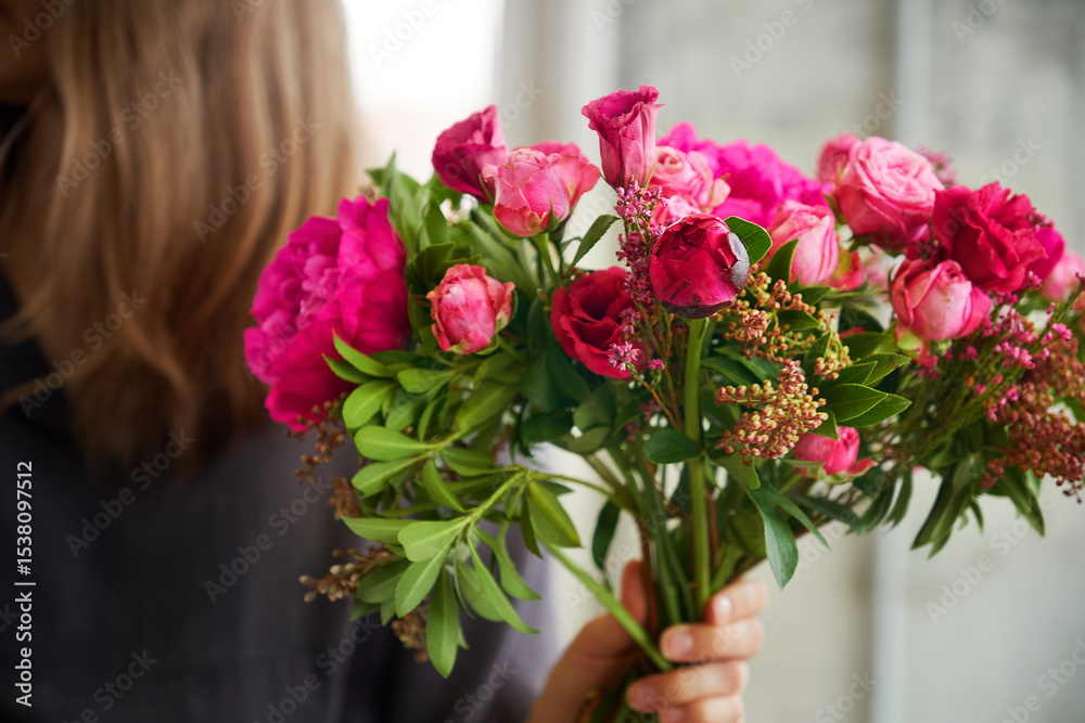 Vibrant, fresh red rose flower bouquet arrangement Vibrant, fresh red rose flower bouquet arrangement