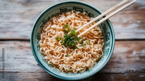 A stylish shot of instant noodles arranged on a table, with a soft focus on the background, showcasing the simplicity and enjoyment of this beloved dish.