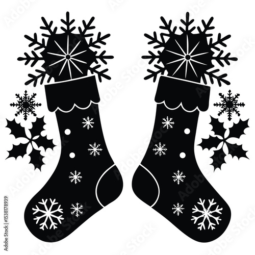 Festive black and white christmas stockings with snowflakes and holly accents for the holiday season