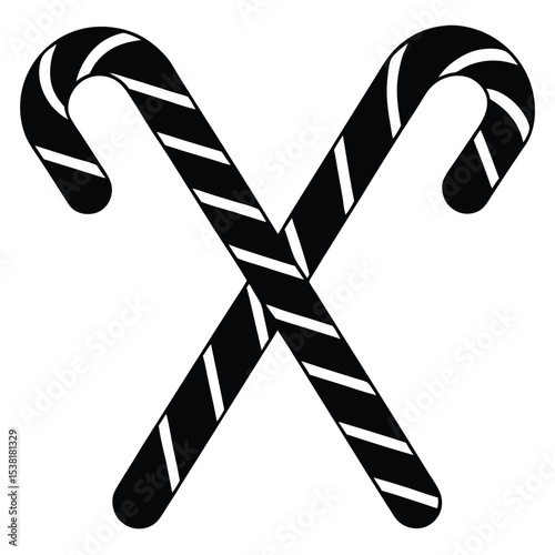 Two crossed black and white candy canes representing christmas holiday decorations