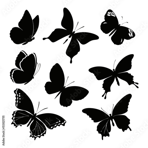 Silhouette Butterflies in Flight: A captivating collection of dark silhouette butterflies delicately positioned to suggest movement and grace.