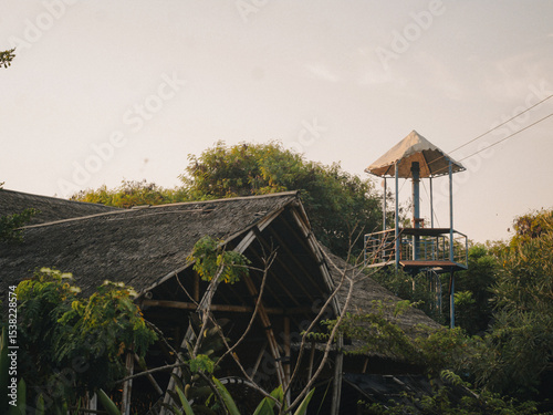 Hut in a park. This hut is made using bamboo and straw as the roof. A place to relax.