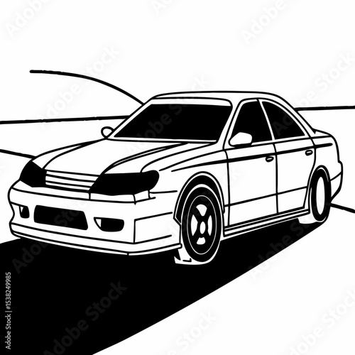 Black and white sports sedan car on curved road