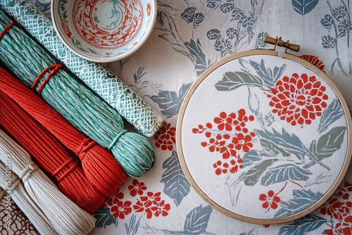 Traditional oriental arts: Still life of old kimono fabric, embroidery hoop, and kumihimo cords