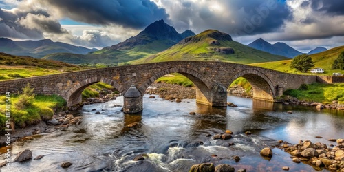 Ancient stone bridge spans serene river crossing in picturesque Sligachan