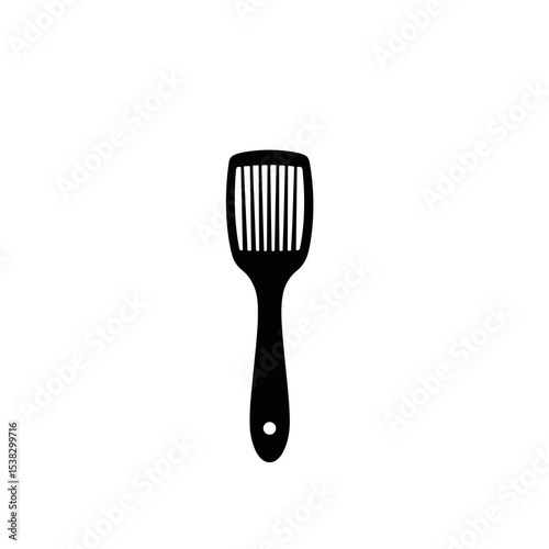 Slotted spatula in black and white, for kitchen blogs with copy space