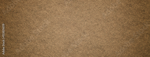 Old brown textured paper background with vignette effect and natural surface, macro. Structure of tan backdrop