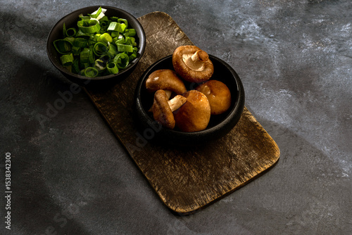 mushrooms and onions on a table