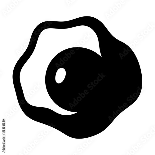 Abstract illustration of a fried egg with irregular shape in black