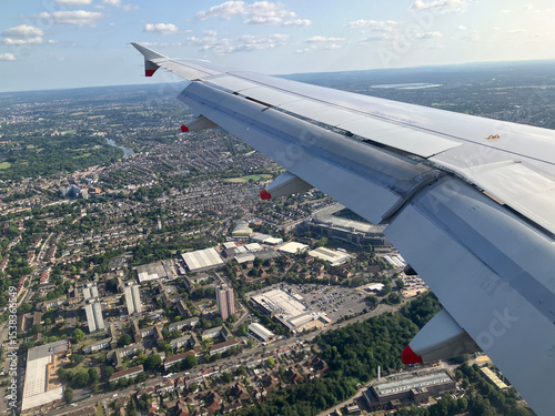 Flying over London on approach to Heathrow airport , UK