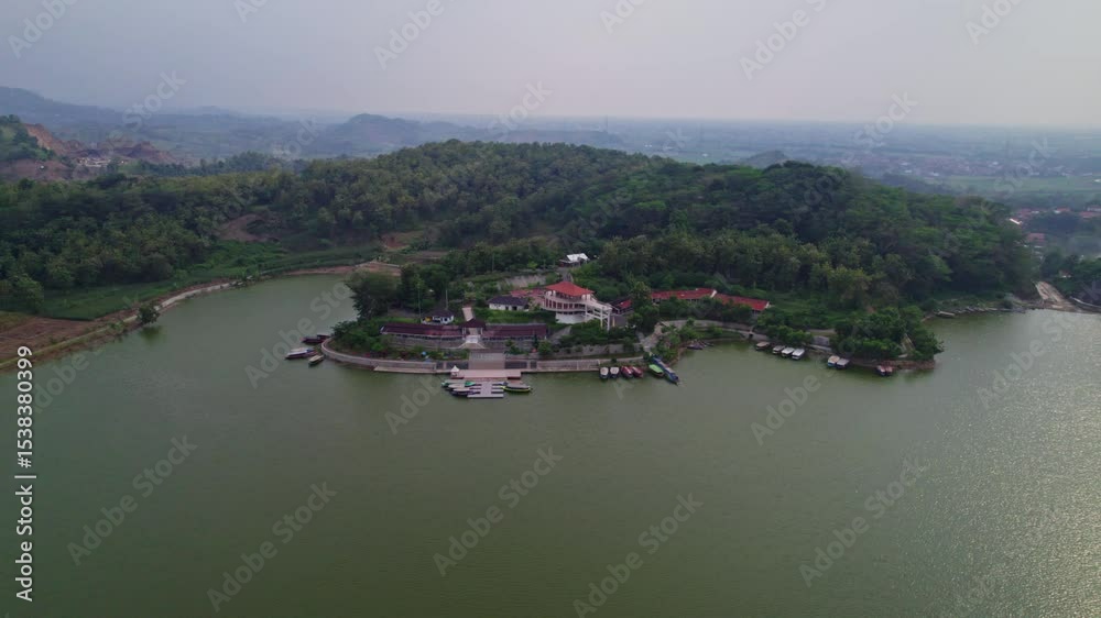 Drone view of dock and view point in cacaban reservoir, tegal, indonesia