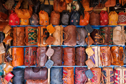 Workers treat leather with softening liquids and dyes at Chouara Tannery, in the Medina quarter of Fez el Bali, Fez, north west Morocco