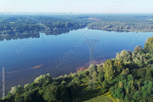 Wallpaper Mural Industrial power tower over natural lake and forest Torontodigital.ca