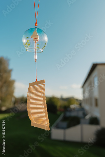 Summer Scene with Wind Chime and Blue Sky