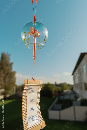 Summer Scene with Wind Chime and Blue Sky