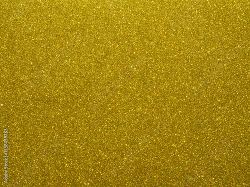 Gold. Golden sparkle background. Golden glitter background. Gold glimmer. Abstract twinkle texture. Glitter surface. Glimmer layout. Holiday layout. Golden luxury surface. Celebration background.