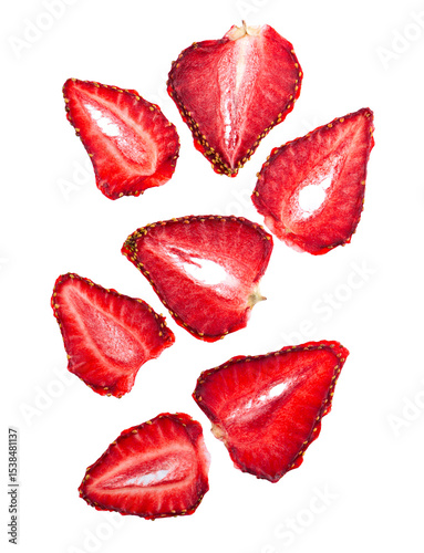 Dried strawberry slices isolated on white background. Dehydrated strawberries chips. Clipping path. Top view.