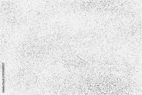 White background with black speckles creating a grainy texture. Ideal for design projects, overlays, and textural effects. High-resolution abstract pattern with versatile applications in design