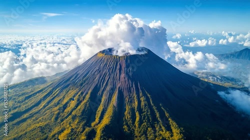 Mount agung volcano emitting smoke and ash into atmosphere.Majestic mount agung volcano emits smoke and ash, creating a breathtaking display of nature's power