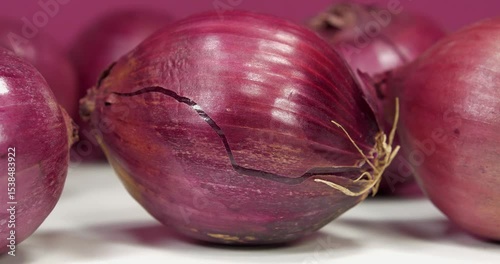 Red onion, which is also called purple onion. Onion - very healthy product with many beneficial properties for health. Cinema 4K 60fps video