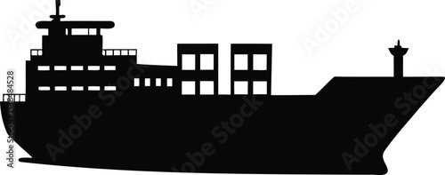 Silhouette of a large cargo ship transporting containers across the ocean