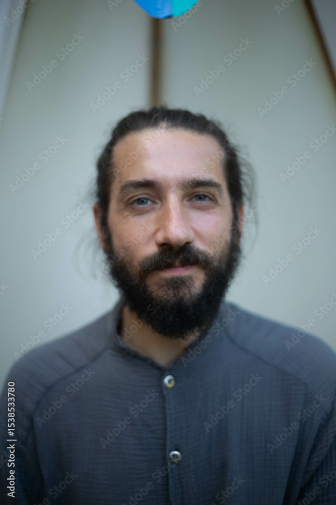 Obraz premium portrait of a man with bun and beard