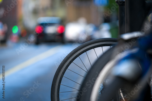 Bicycle wheel against defocused street
