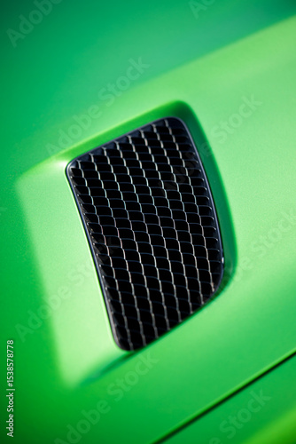 Aerodynamic green exotic supercar carbon part