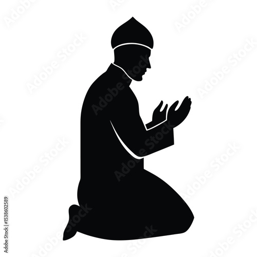 Silhouette of muslim man praying on knees in traditional dress