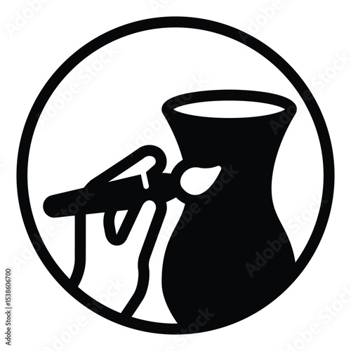 Clay jug and hand with brush solid icon, pottery making concept. Vector graphics. Artistic painting for clay product sign on white background, style mobile or design.