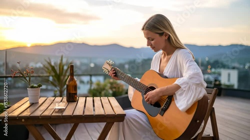 Woman playing acoustic guitar in a cozy room with warm lighting and musical vibes surrounding her