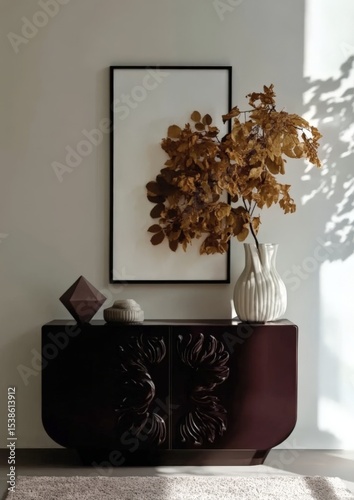 Modern interior design with stylish sideboard, geometric decor, and autumnal foliage in vase