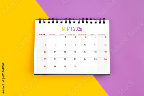 September 2026 Monthly desk calendar for 2026 year on yellow and purple color background.