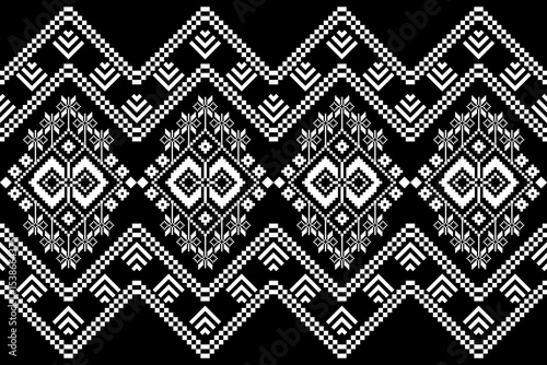 Geometric pixelated Arabic patterns on the fabric reflect the ornate and ethnicity,grid floral,grid colourful, backgrounds, seamless grid design for carpet,textile,textured,wallpaper,print,decorate