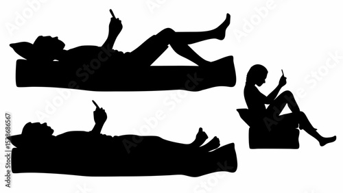 Silhouettes of people using mobile phones while lying and sitting on cushions and mattresses | eps vectors