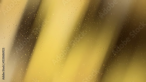Golden, water-spotted surface with diagonal streaks.